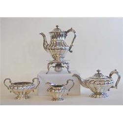 FOUR PIECE GEORGE IV STERLING SILVER TEA SERVICE English. London. 1827-1828. Maker: John Angell,...