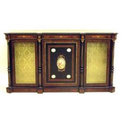 NAPOLEON III GILT BRONZE MOUNTED EBONIZED AND BURL CREDENZA French. Circa 1865. The rectangular t...
