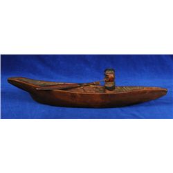 Northwest Coast Canoe Carved with Paddler and Paddle 12" L. 4" W.  Good Condition