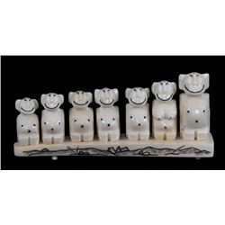 Inuit Greenland Culture family of Seven Billikins - Marine Ivory- Signed on Bottom 7" L. 3" H.  Good