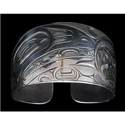Northwest Coast Silver Bracelet with Incised Raven Stealing the Sun Design Signed Sweewa 9" L. 2" W.