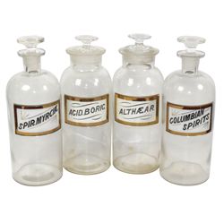 Drug store apothecary bottles (4), all label under glass round bottles w/ground necks & stoppers, ni