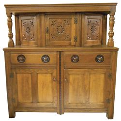 Furniture, English oak press cupboard, top section has metal pegs on 2 corners, center door opens to
