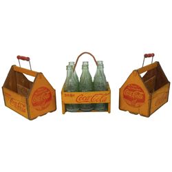 Coca-Cola bottle carriers (3), all are wood, one w/rope handle, all VG cond, 8"H x 8.5"W.