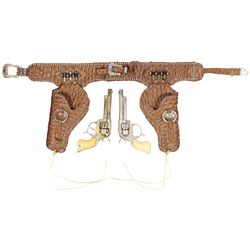 Toy cap guns & holsters, Gene Autry set w/Leslie Henry pistols, guns have revolving  barrels, side l