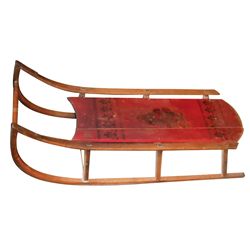Child's sled w/Santa, orig red paint w/painted black Santa, wood runners w/steel cap, old crack on s