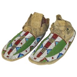 Native American moccasins, hide & sinew beaded w/white, red, pea green, yellow, blue & teal colors, 