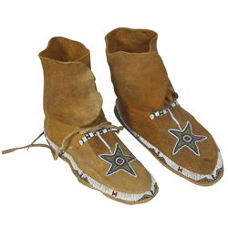 Native American moccasins, softly tanned hide, thread & sinew, beaded w/red, white, teal, yellow, da