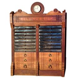 Spool cabinet, Belding's Silk w/clock top, walnut w/16 beveled glass drwrs & 6 wood, VG/Exc cond, 43