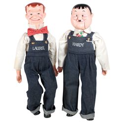 Toys (2), ventriloquist Laurel & Hardy dolls dressed in overalls, plastic & cloth, on stands, smilin