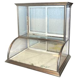 Showcase, nickel silver w/curved glass front, painted wood sliding doors at back, overall Good cond,