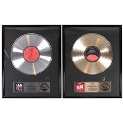Music awards (2), "Theater of Pain & Shout at the Devil" Platinum & Gold RIAA awards presented to th