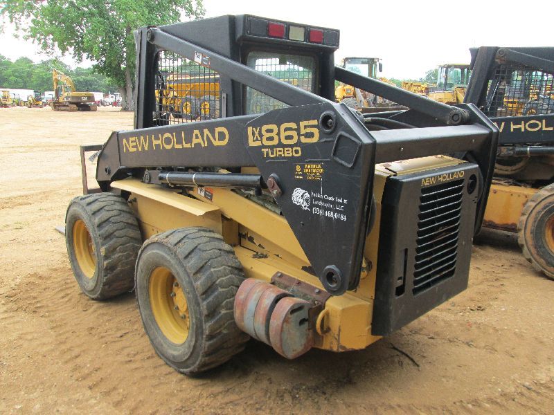 NEW HOLLAND LX865 TURBO SKID STEER LOADER, S/N 101962, FORKS, CANOPY