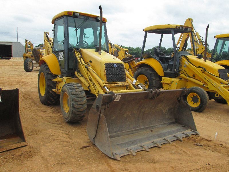 FORD NEW HOLLAND 555E 4X4 LOADER BACKHOE, S/N 03125213, MP BUCKET, ECAB W/AIR, METER READING