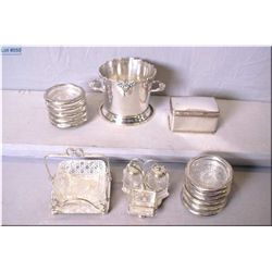 A selection of silver plate including hinged lidded box, ice bucket, small condiment galley, coaster