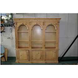 Large modern storage/display unit with carved decoration approx. 85" high, 85" wide