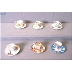 Six demi-tasse cups and saucers including Spode India tree, Royal Doulton etc.