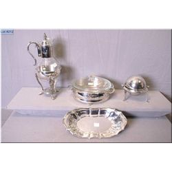 Four pieces of silver plate including carafe in galley, a celery tray, butter dish with liner and a 