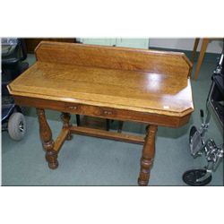A quarter cut oak console table with backboard