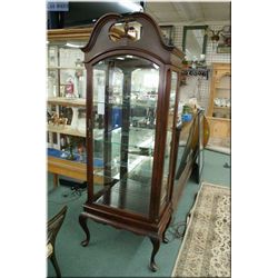 Solid mahogany single door illuminated curio cabinet made by Gibbard