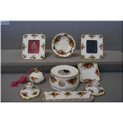 A selection of Royal Albert  Old Country Roses  including candle holders, picture frames, perfume bo