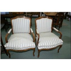 Two French style open arm parlour chairs with tasteful carving