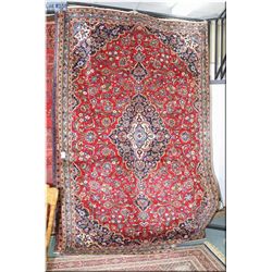 Iranian wool area rug with large center medallion and overall geometric floral design in shades of c