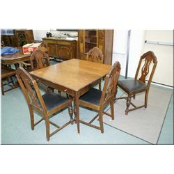 Extending dining table with five insert leafs and five dining chairs