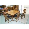 Image 1 : Extending dining table with five insert leafs and five dining chairs
