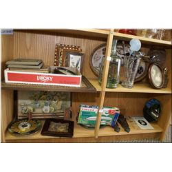 A selection of collectibles including graduated pitcher and bar utensils, interesting bottles and fr