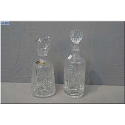 Two crystal decanters with stoppers, one labelled Czechoslovakia