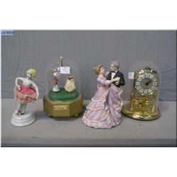 Three musical figurines and an Anniversary style domed clock