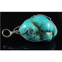 NATURAL 250.97CTW TURQUOISE WIRE WRAPPED PENDANT