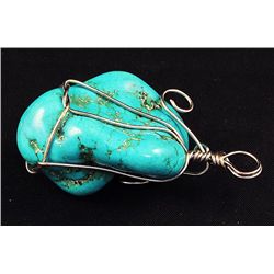 NATURAL 135.55CTW TURQUOISE WIRE WRAPPED PENDANT