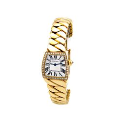 Lady's 18K Yellow Gold Cartier Dona Watch. Silver Roman