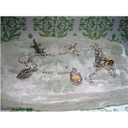 STERLING SILVER .925 CHARM BRACELET T.W. 9.6 GRAMS