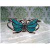 Image 1 : STERLING SILVER CUFF BRACELET WITH CRUSHED TURQUOISE BUTTERFLY T.W. 15.00 GRAMS