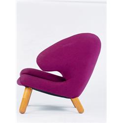 FINN JUHL an important and rare "Pelican" Chair, ca. 1940 produced by cabinetmaker Niels Vodder m...
