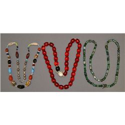 THREE TRADE BEAD NECKLACES