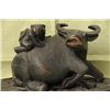 Image 1 : Antique Wood carving of an ox and a child on a fitted s
