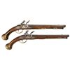 Image 1 : Highly Decorative Pair of Unmarked Engraved Gold Inlaid European Holster Flintlock Pistols with Reli