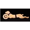 Image 1 : Bone pasta crimper wheel of a running dog.  The darker