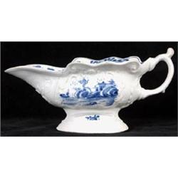 A Late 18th Century Porcelain Sauce Boat, decorated in underglaze blue with Oriental fisherman (c...