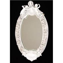 A 19th Century Oval Porcelain Wall Mirror, with putti and cartouche surmount, the frame with a be...