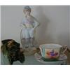 Image 1 : A Bisque Figure, with a penny farthing bicycle, a fairing in the form of a car with pig driver, a...