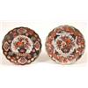 Image 1 : A 19th Century Japanese Imari Plate, of circular lobed form, decorated a vase of flowers, 21 cm,...