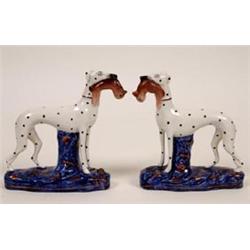 A Pair of Staffordshire Greyhounds, on blue and lustre oval bases, 19 cm (2)  See illustration £1...