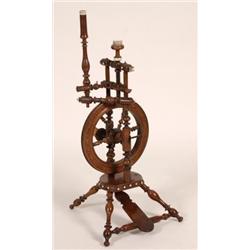 A 19th Century Spinning Wheel, with ivory mounts  See illustration £80-120...