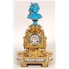 Image 1 : A 19th Century French Ormolu Clock, the 8 cm diameter dial painted a cherub, the case with a turq...