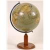 Image 1 : A 20th Century Terrestrial Globe, on a beech stand inset a compass  See illustration £140-160...